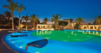 08-caramel-crete-island-resort-pool-by-night