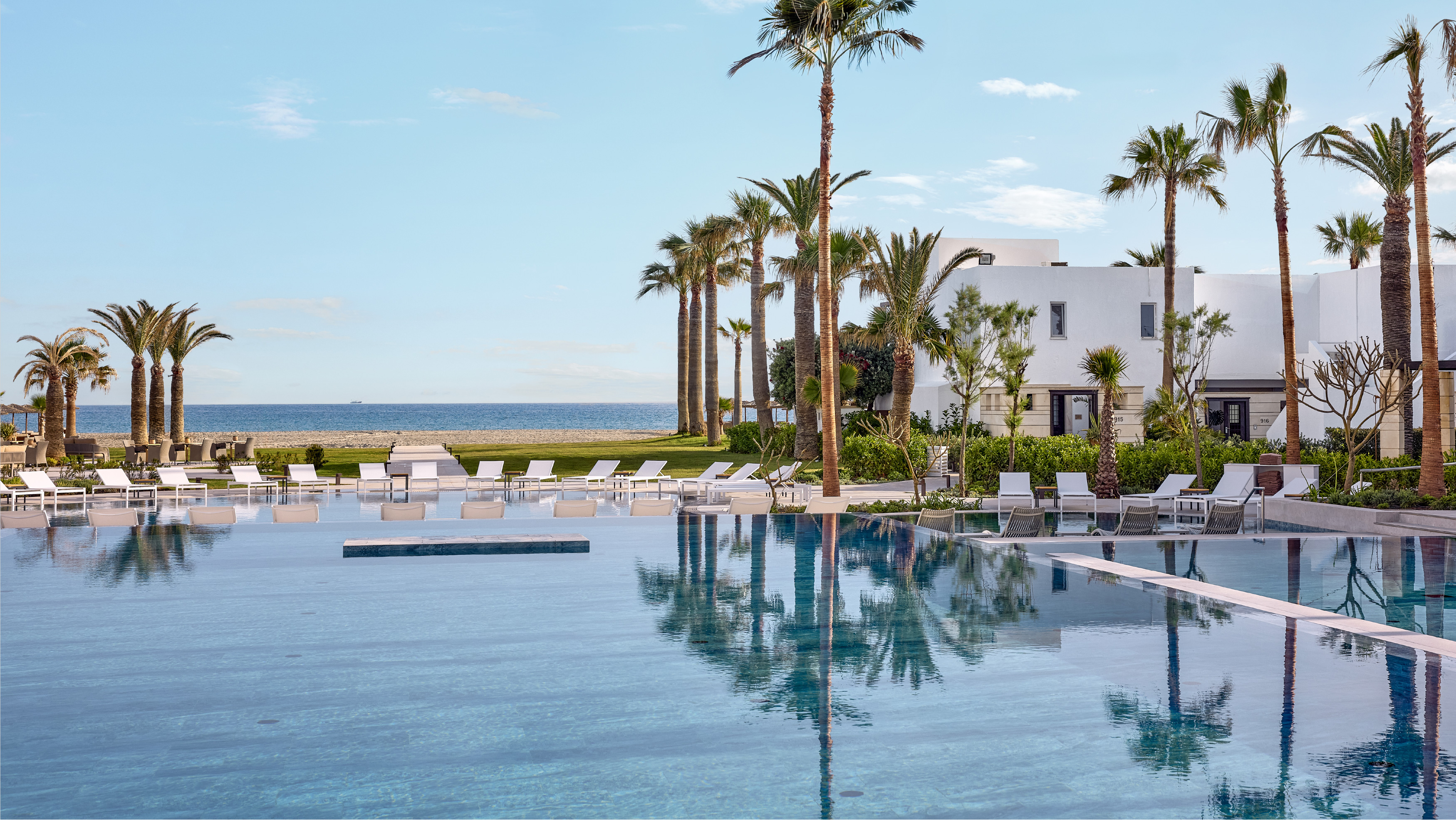 Beach and pools at Grecotel Creta Palace luxury seaside resort