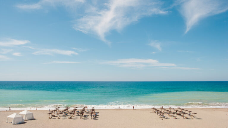 View of Grecotel Creta Palace and its beachfront setting on the coast of Rethymno, Crete.