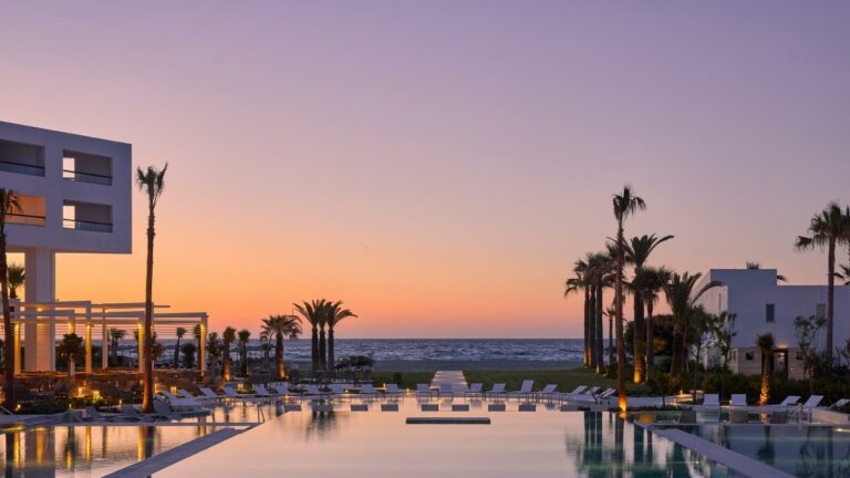 Views of Grecotel Creta Palace resort, gardens, swimming pools and beach along the coast of Crete.