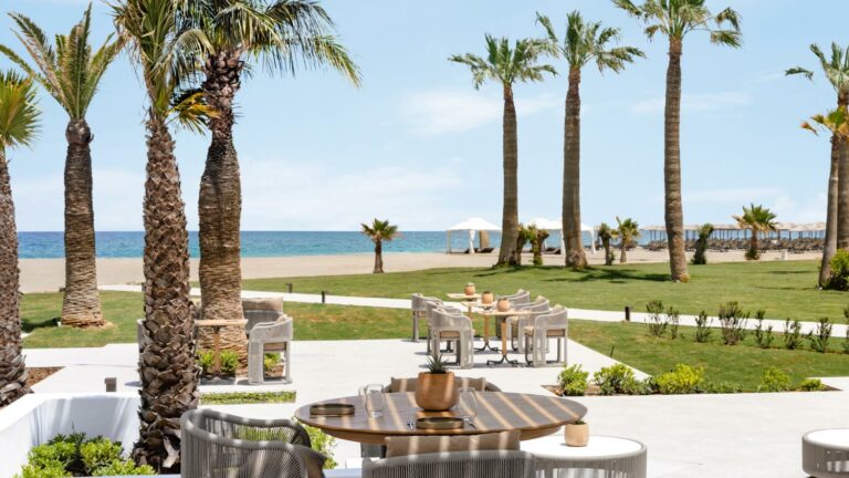 Brasserie Ariadne beachfront restaurant with outdoor seating at Grecotel Creta Palace