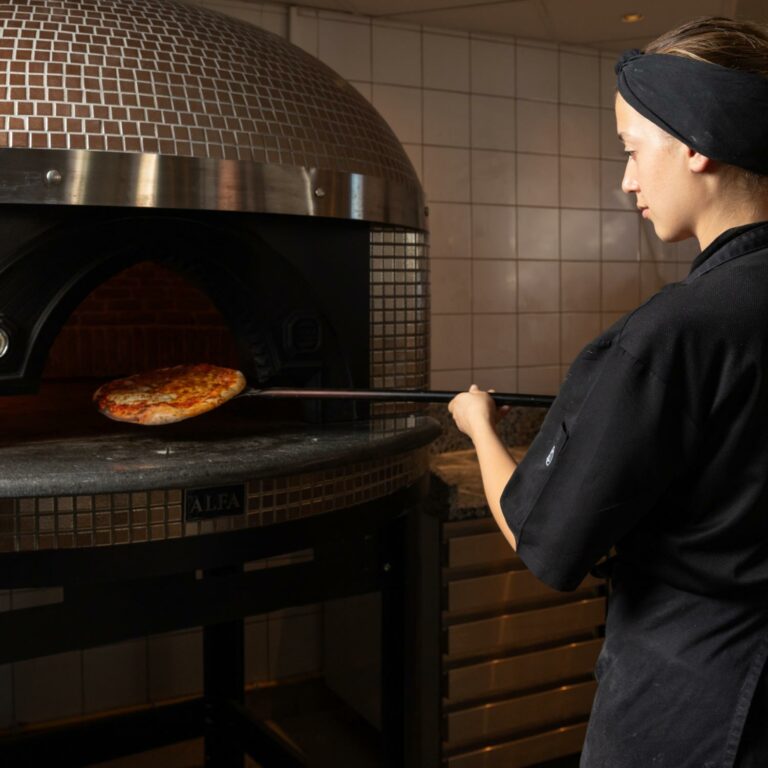 Handmade pizza and Italian kitchen at La Trattoria Grecotel Creta Palace