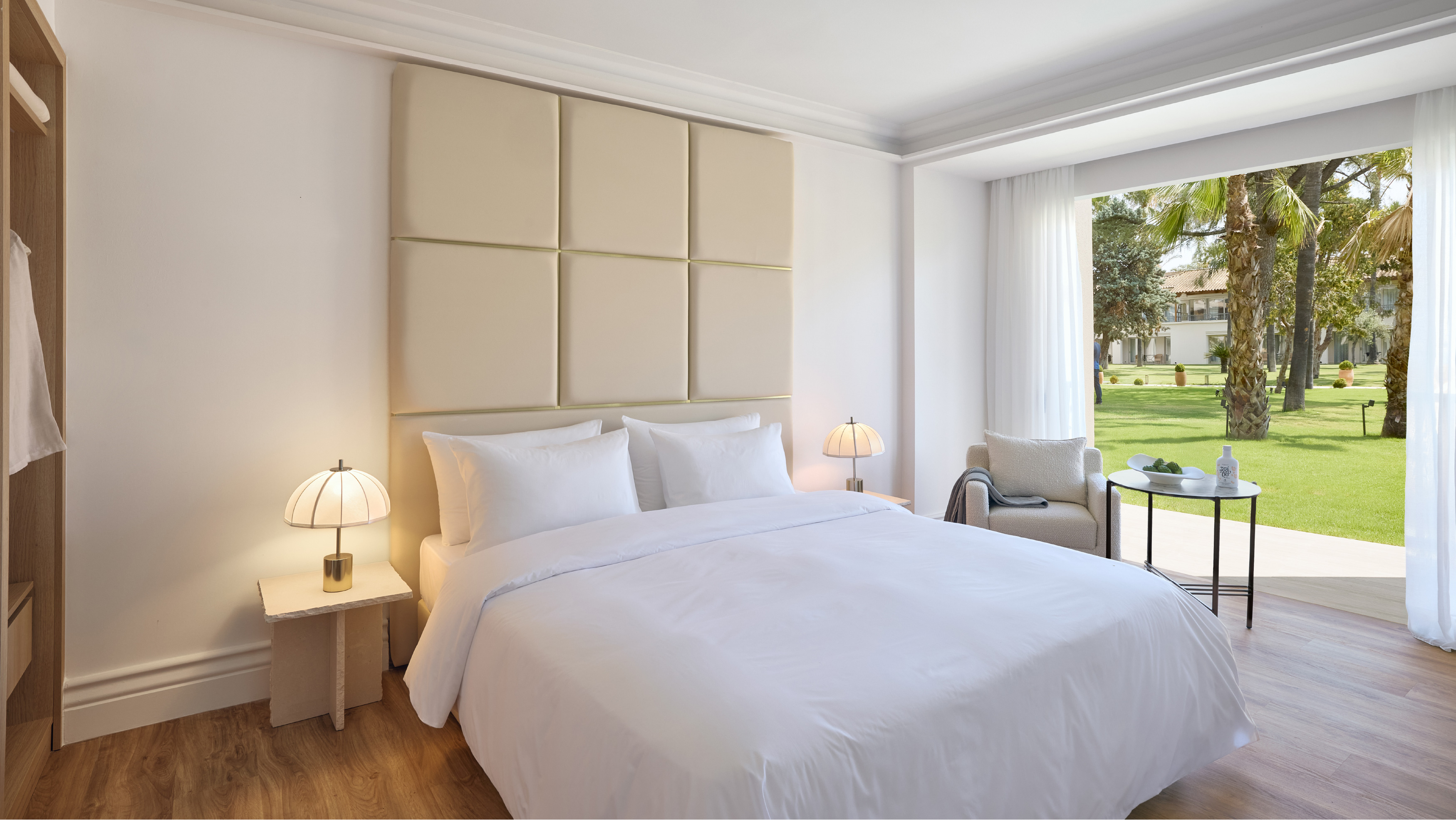 Deluxe Family Suite bedroom with direct access to the garden patio