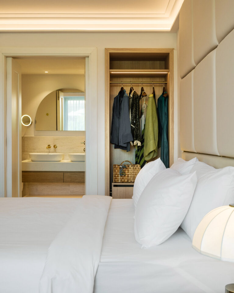 Deluxe Family Suite bedroom with wardrobe and ensuite bathroom