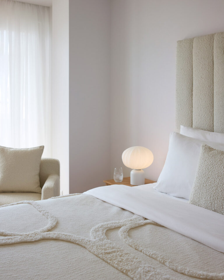 Two Bedroom Luxury Suite bedroom with soft neutral decor