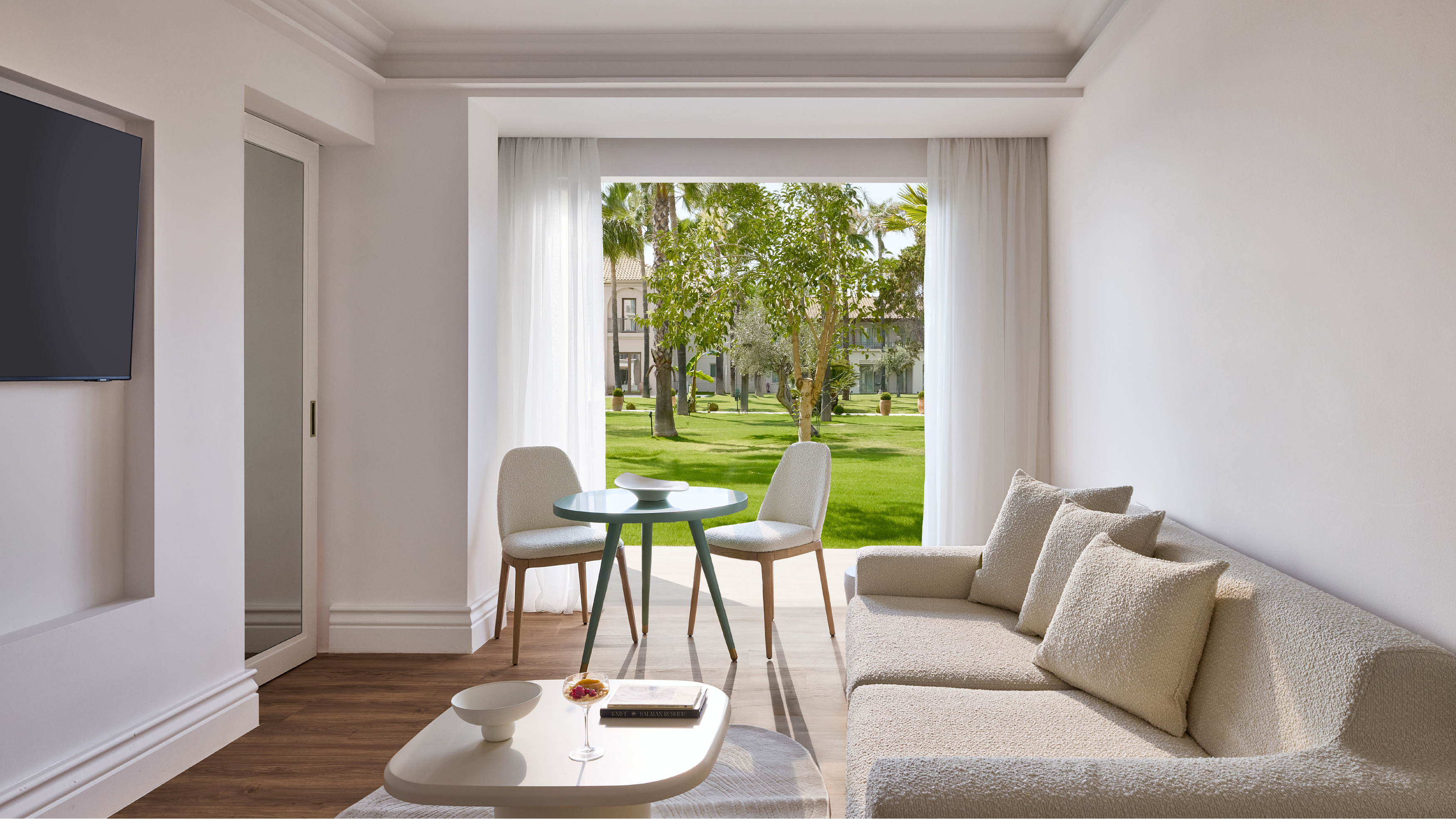 Garden patio area of the Deluxe Family Suite at Filoxenia Kalamata