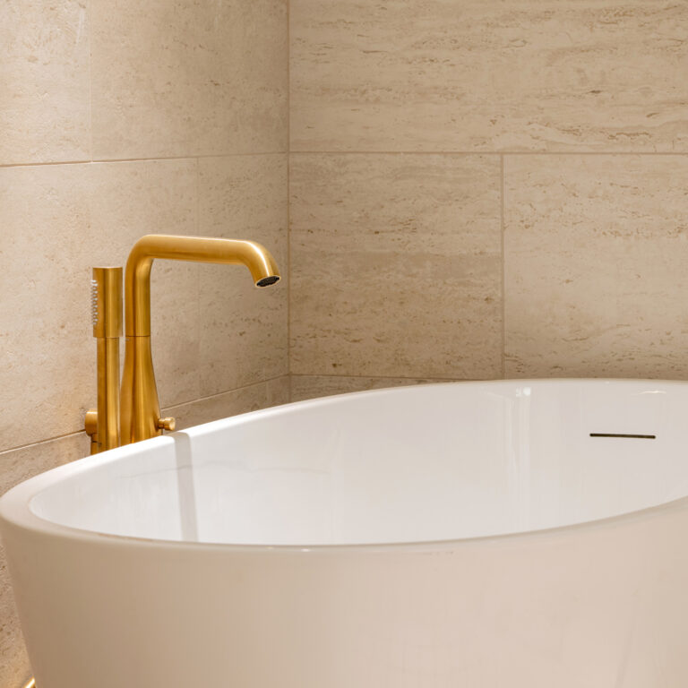 Bathroom with bathtub in the Deluxe Family Suite
