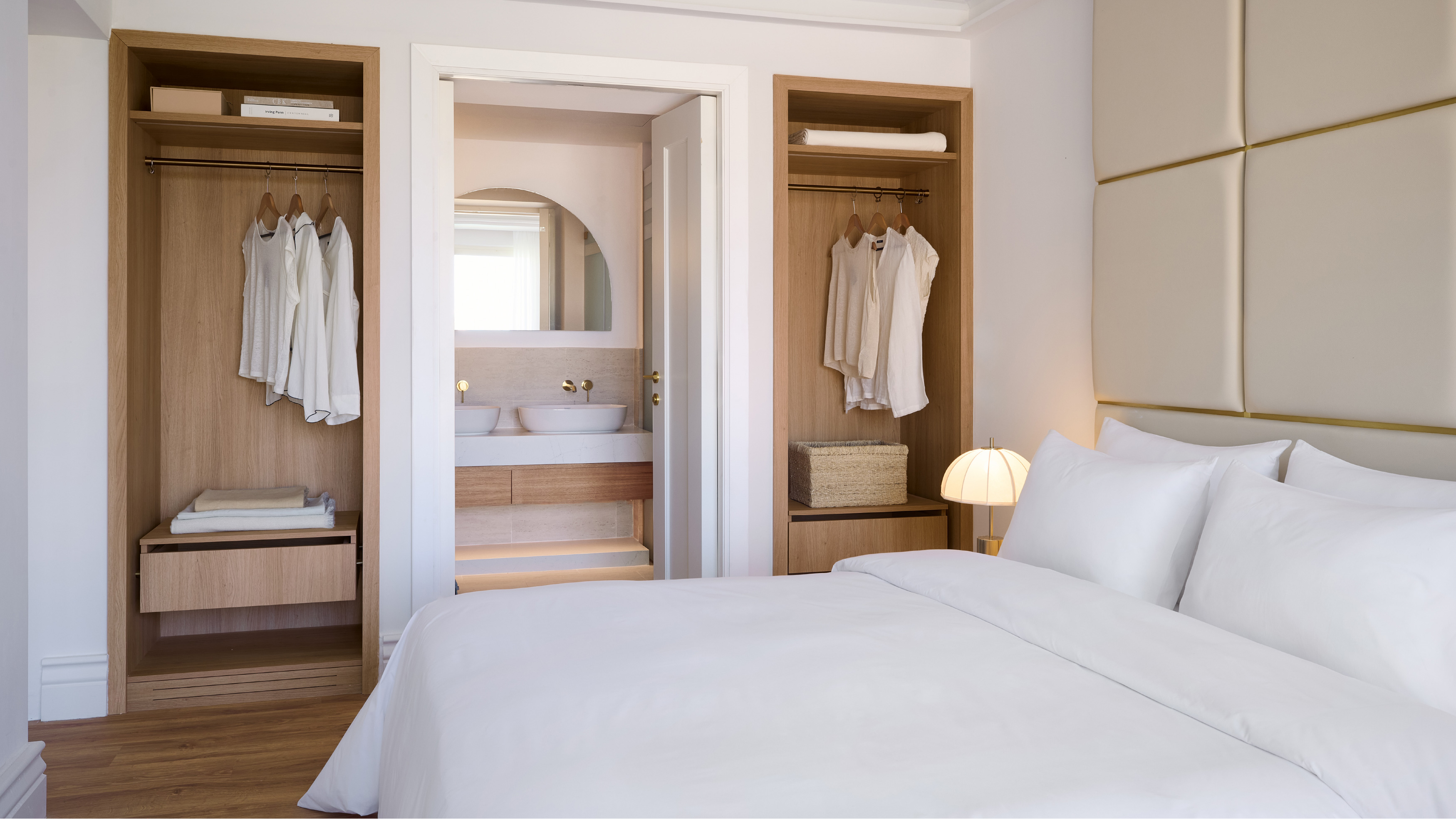 Two Bedroom Luxury Suite at Filoxenia Kalamata Grecotel with stylish bedroom and living spaces