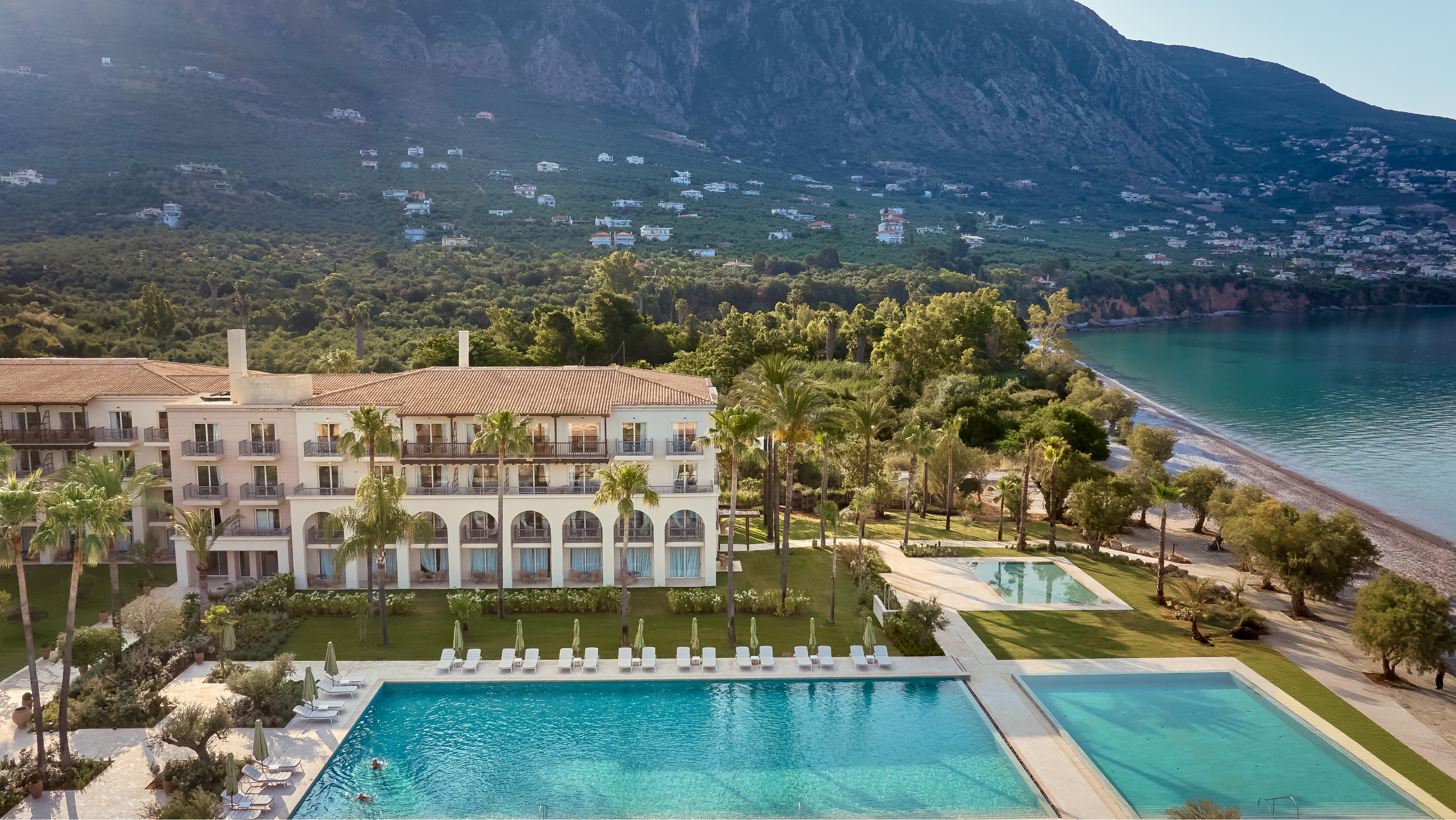 Panoramic pool views from the Two Bedroom Luxury Suite at Filoxenia Kalamata