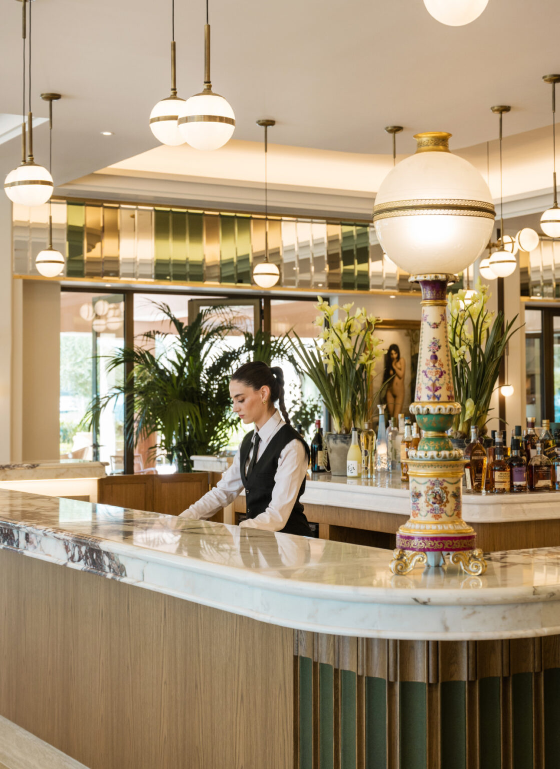 Hotel staff member at the elegant lobby bar
