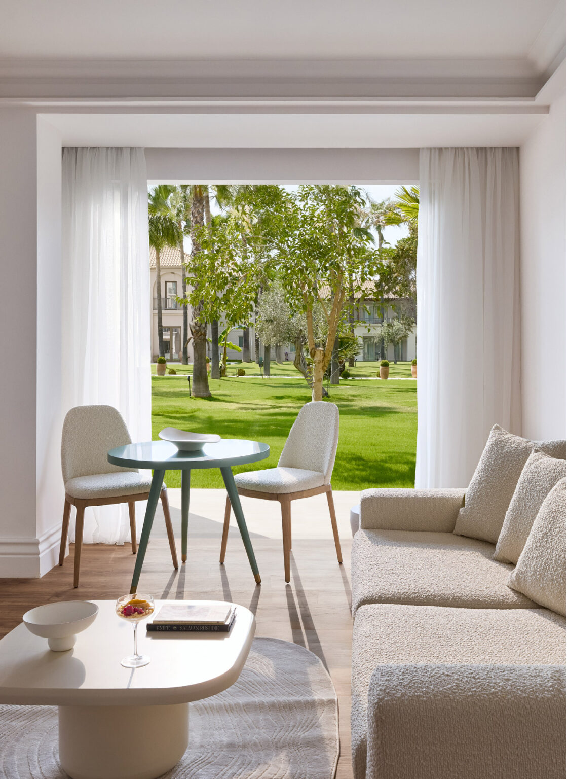 Deluxe Suite living area with direct views of the landscaped gardens