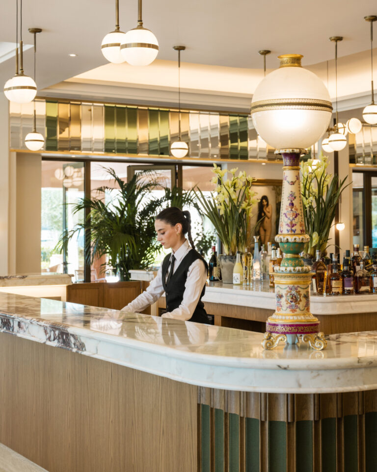 Hotel bar with a selection of drinks and seating areas