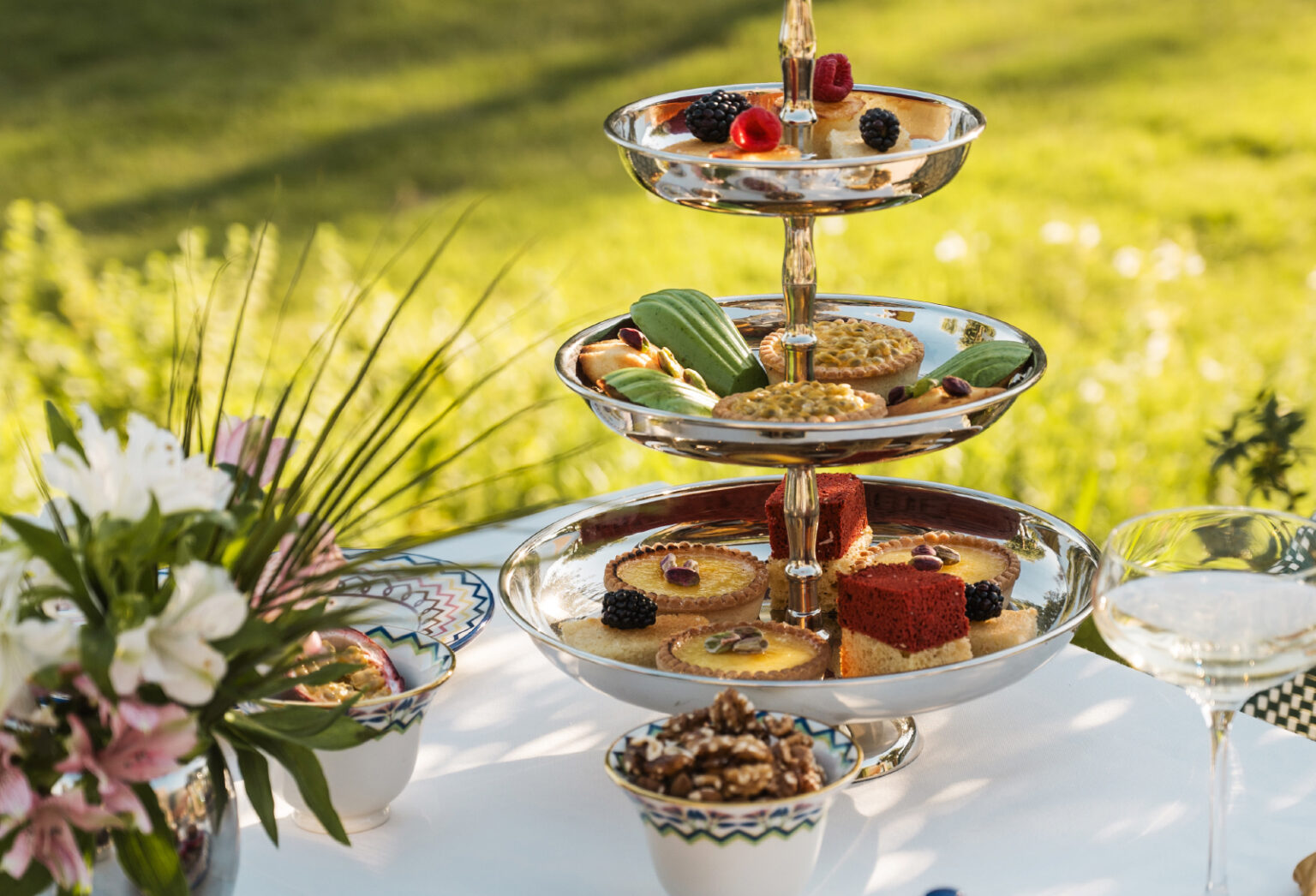 Outdoor table with a selection of sweet and savoury treats