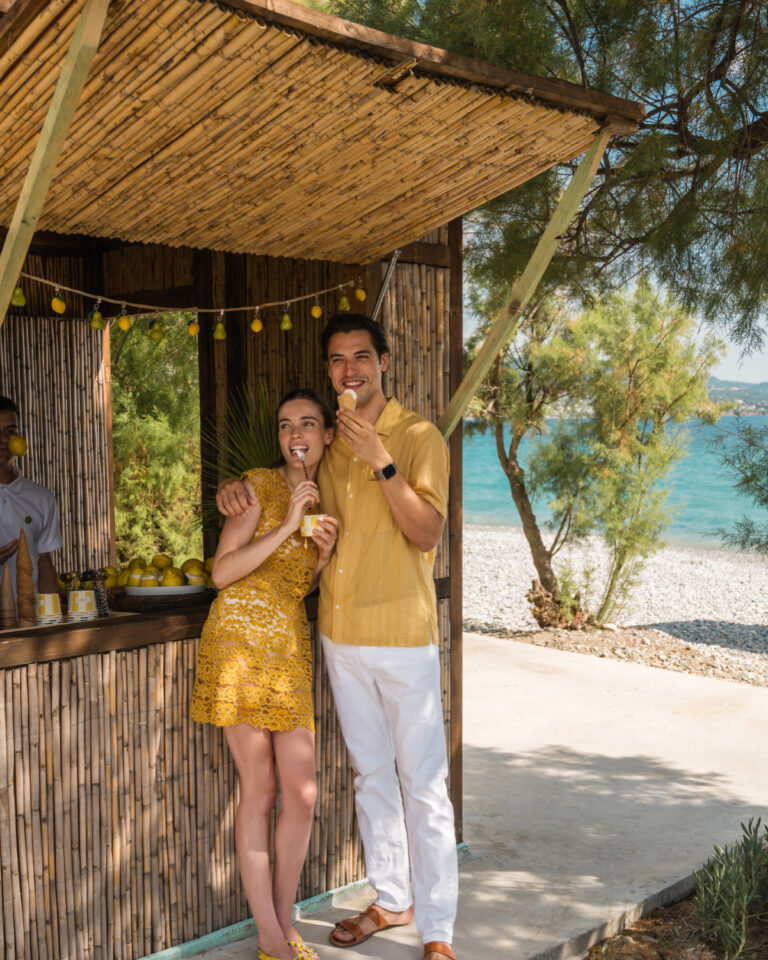 Couple enjoying ice cream at the beachfront gelateria of Grecotel Filoxenia Kalamata