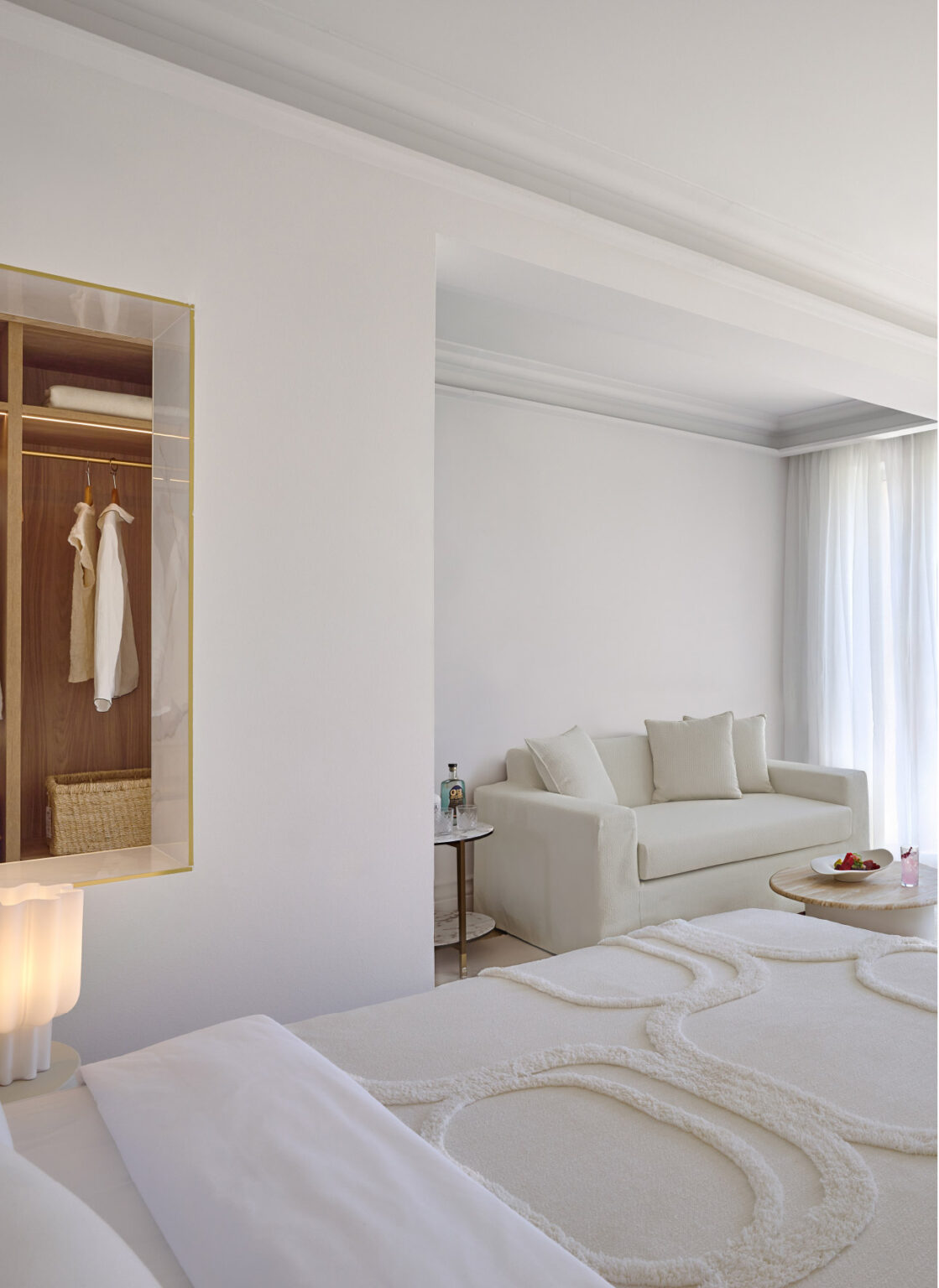 Deluxe Room interior with sitting area and furnished veranda