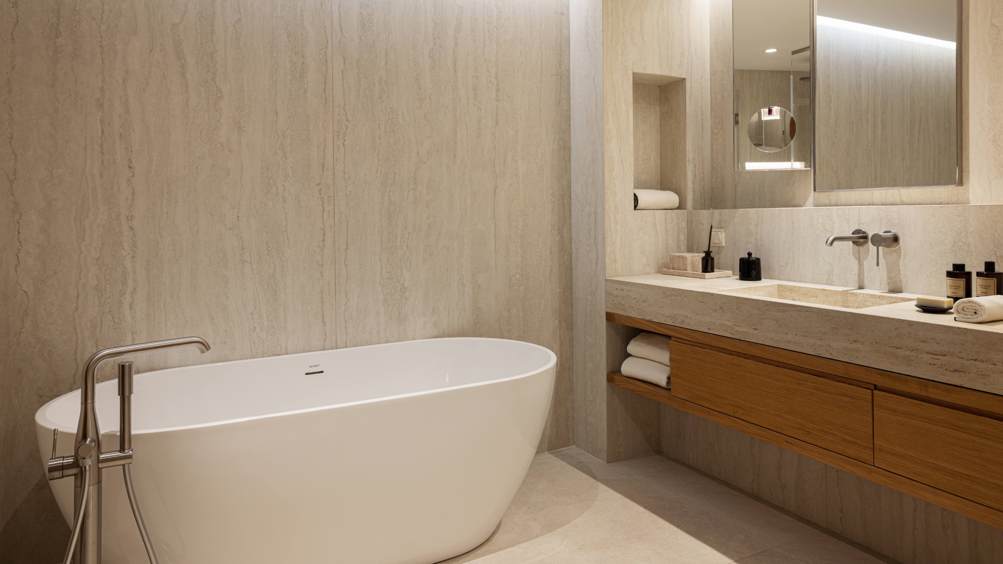Bathroom details in luxury family suite with shared pool