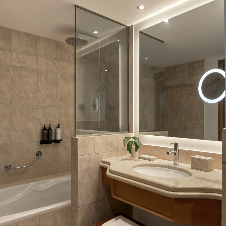 Bathroom details in bungalow with pool view