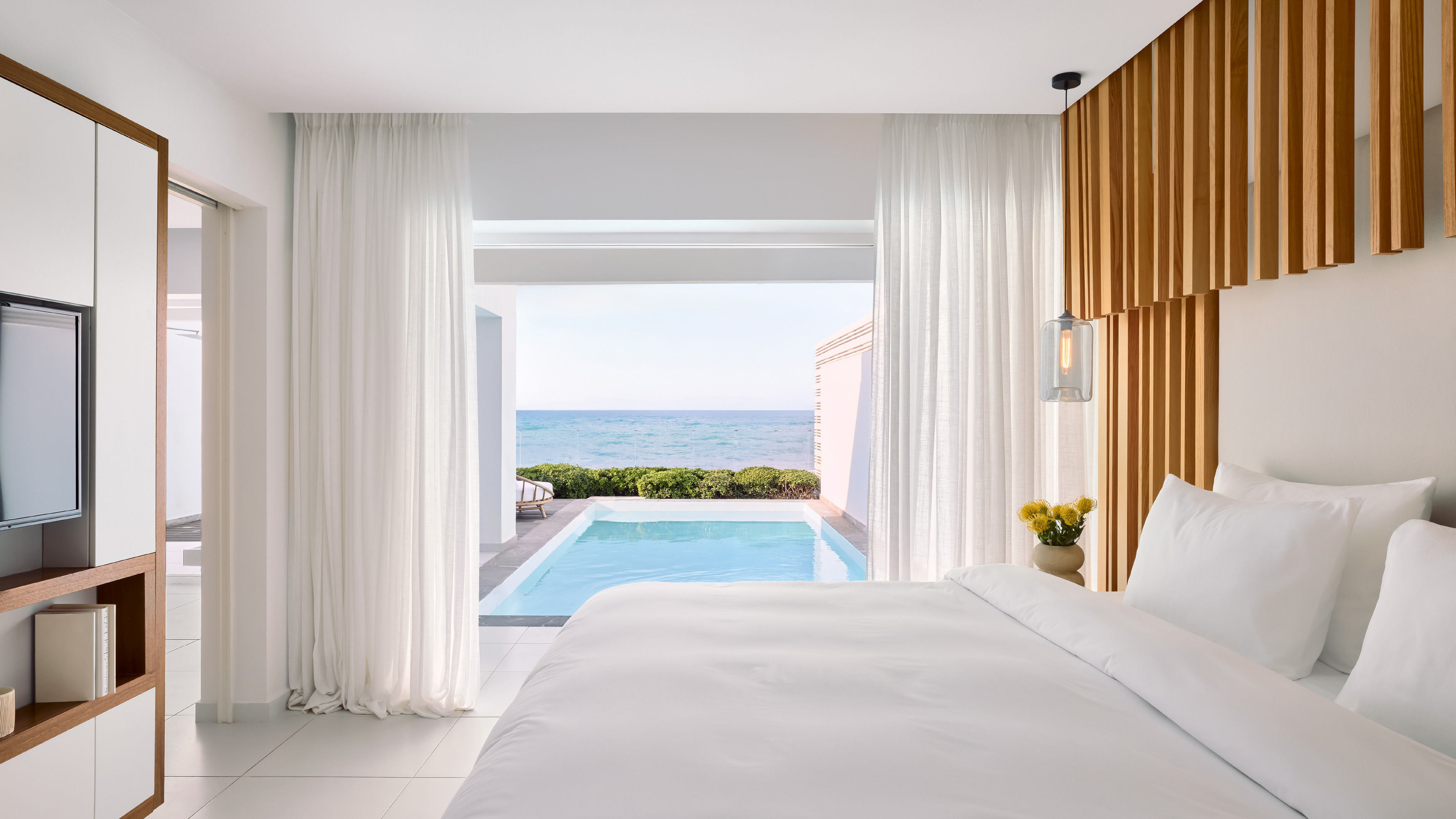 Luxury bedroom with private pool and sea view at Grecotel LUXME White Palace in Crete