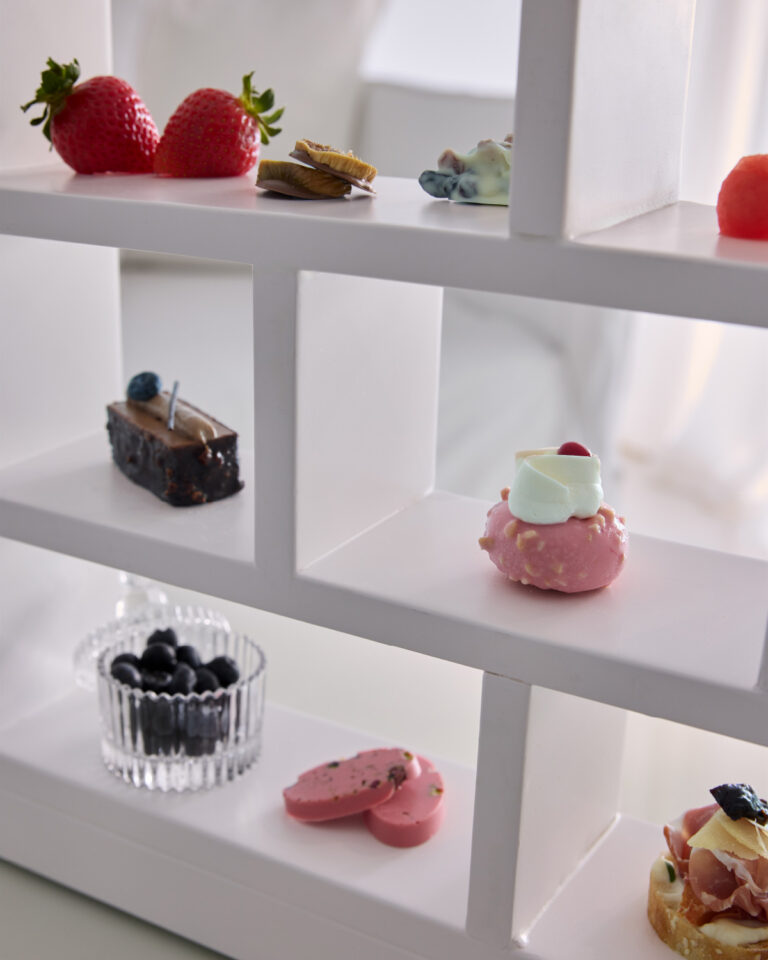 Welcome sweets and fresh fruit in a Grecotel LUXME White Crete White Family Suite.