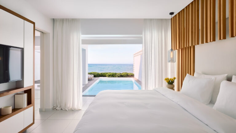 Honeymoon setup with flowers and sea view at Grecotel LUXME White Crete.