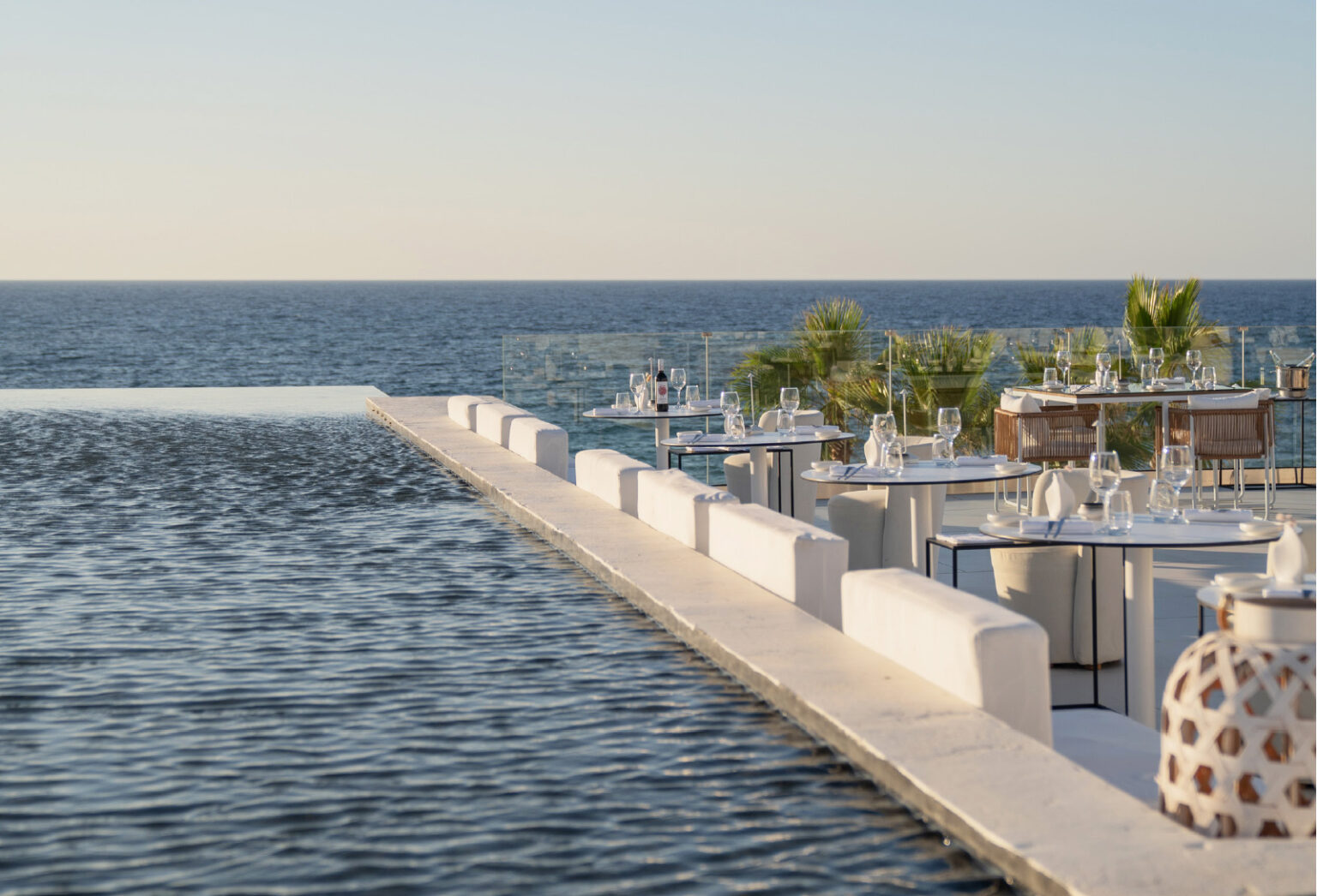 The White Restaurant logo at Grecotel LUXME White Crete.