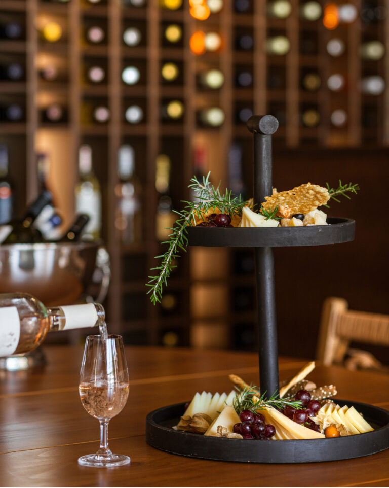 Wine served with cheese and fruit at Grecotel LUXME White Crete.