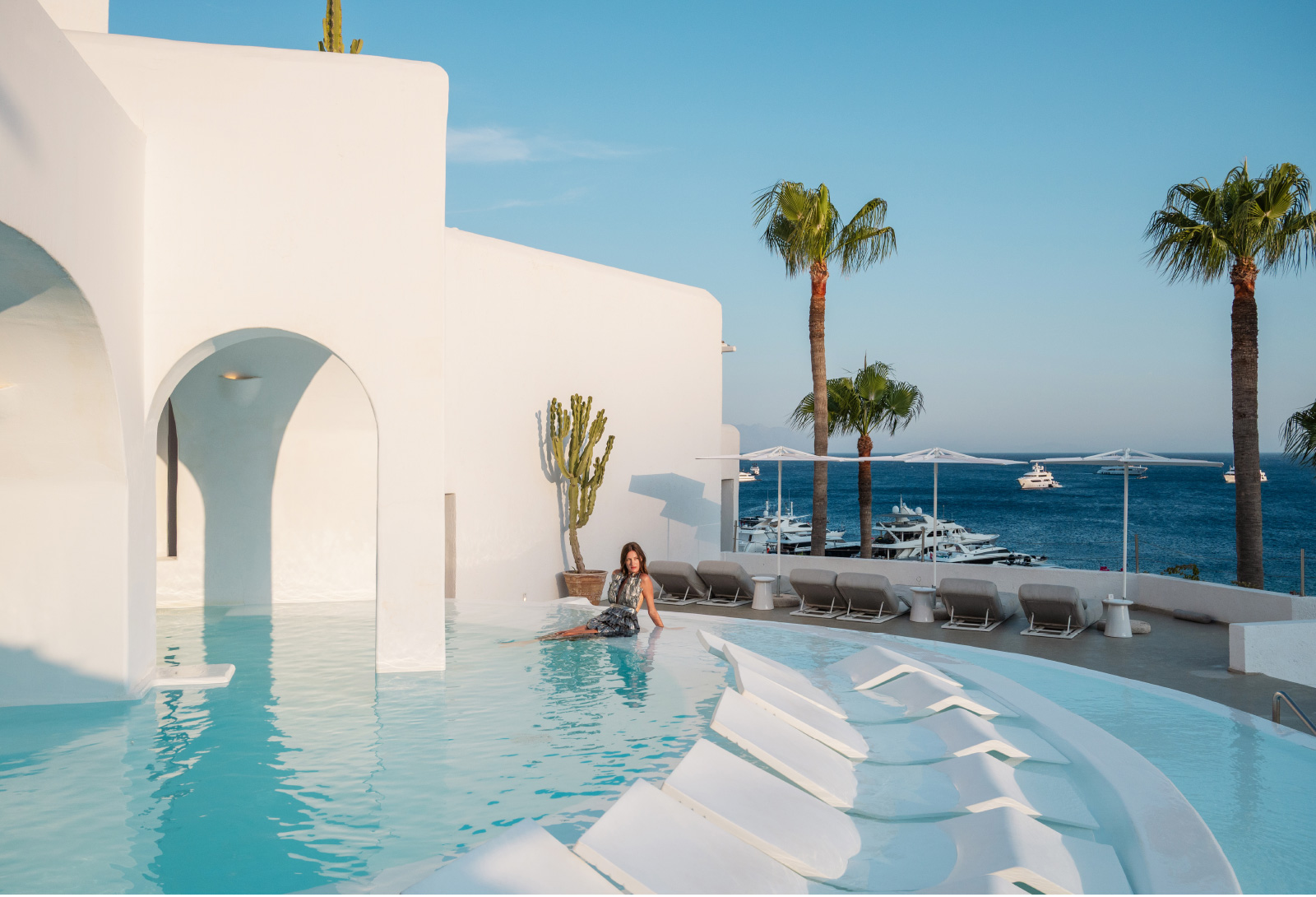 Mykonos Blu Grecotel pool overlooking Psarou Bay Mykonos — photo 4